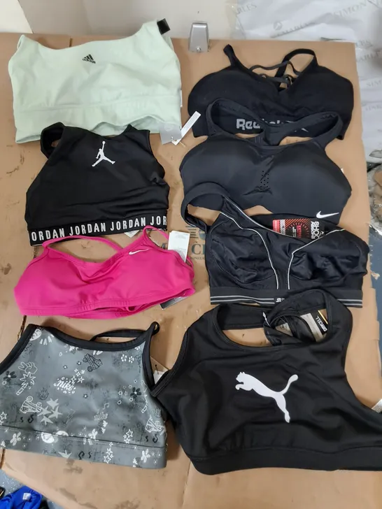 APPROXIMATELY 12 ASSORTED PIECES OF FEMALE GYM WEAR TO INCLUDE SPORTS BRAS IN VARIOUS SIZES AND STYLES 