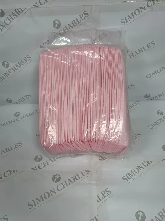 LOT OF APPROXIMATELY 15 PACKS OF PROTECTIVE BED PADS IN PINK