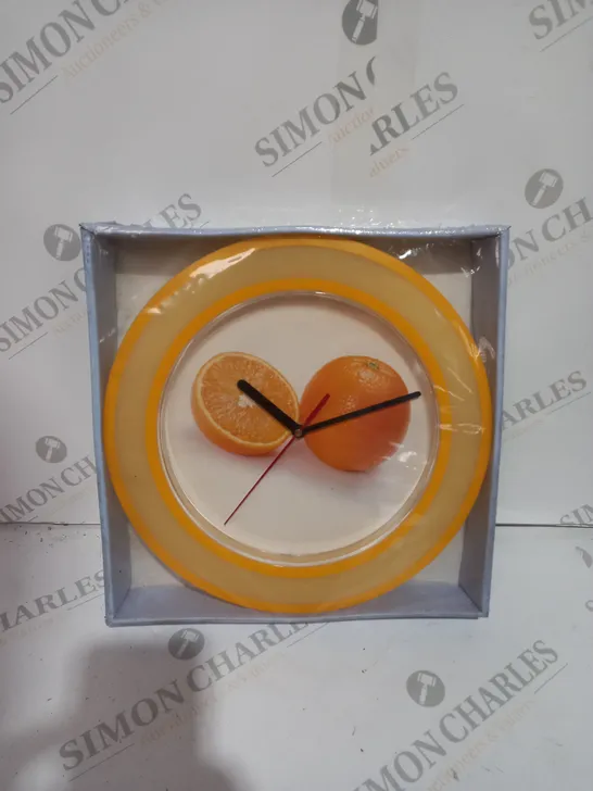 BRAND NEW BOX OF APPROX 10 UNBRANDED FRUIT QUARTZ CLOCKS, ORANGE