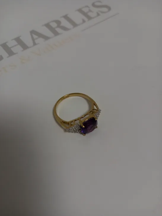 DESIGNER 9CT GOLD RING SET WITH A CUSHION CUT AMETHYST AND DIAMONDS WEIGHING +-1.58CT