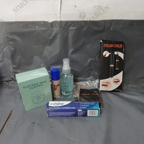 APPROXIMATELY 20 ASSORTED COSMETIC PRODUCTS TO INCLUDE EYE LASH CURLERS, RIMMEL FOUNDATION, AND ELECTRIC NAIL CLIPPERS ETC. 