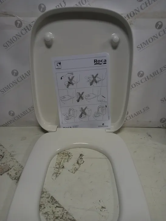 BOXED ROCA TOILET SEAT IN WHITE 