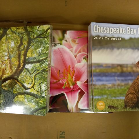 LOT OF APPROXIMATELY 10 ASSORTED BRIGHT DAY COMPANY 2022 CALENDARS TO INCLUDE CHESAPEAKE BAY RETRIEVERS, LILIES, TREES, ETC
