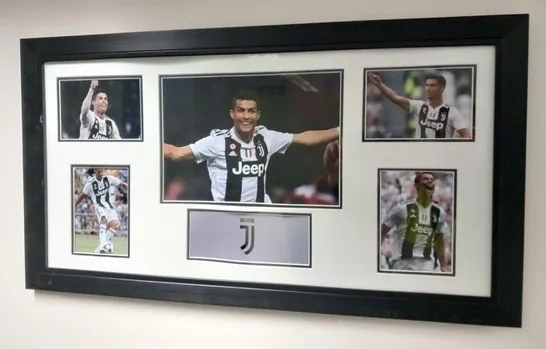 TWO FRAMED CRISTIANO RONALDO COLLAGES ONE DEPICTING HIS TIME AT REAL MADRID AND ONE DEPICTING HIS TIME WITH JUVENTUS