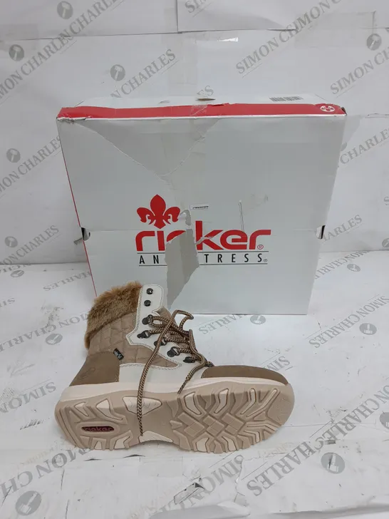 BOXED PAIR OF RIEKER CREAM WINTER FUR HIKE BOOTS IN SIZE 5 