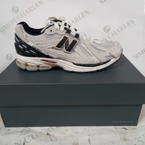 BOXED PAIR OF NEW BALANCE 1906D SHOES IN GREY UK SIZE 7