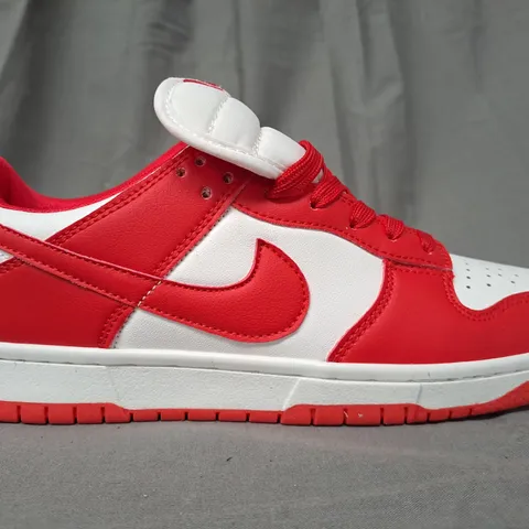 BOXED PAIR OF NIKE TRAINERS IN RED/WHITE UK SIZE 7