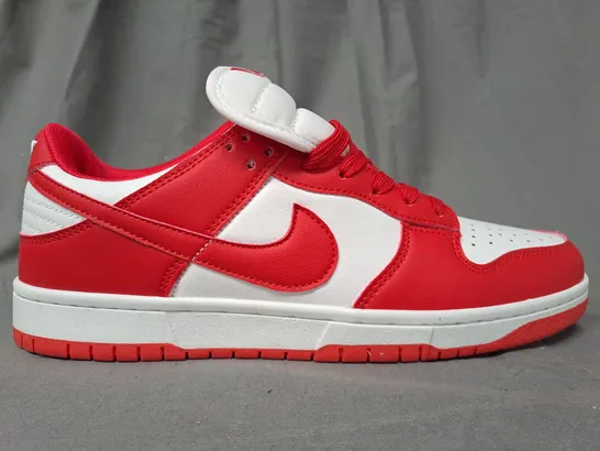 BOXED PAIR OF NIKE TRAINERS IN RED/WHITE UK SIZE 7