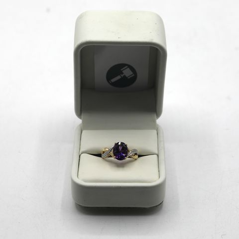 DESIGNER 9ct YELLOW GOLD RING SET WITH AN OVAL CUT AMETHYST TO DIAMOND TWIST SHOULDERS, WEIGHT +-2.24ct