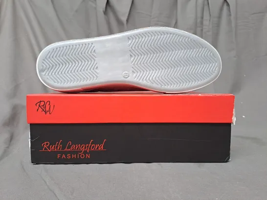 BOXED PAIR OF RUTH LANGSFORD ZIP DETAIL TRAINERS IN SILVER SIZE 8