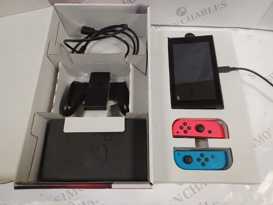 BOXED NINTENDO SWITCH WITH CONTROLLERS AND ACCESSORIES