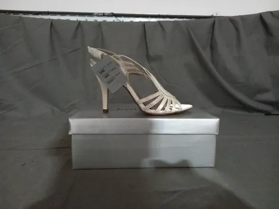 APPROXIMATELY 12 BOXED PAIR OF CASANDRA IVORY HEELED SANDALS IN VARIOUS SIZES TO INCLUDE SIZE 5