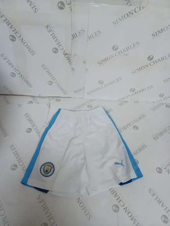 MANCHESTER CITY FC HOME SHIRT AND SHORTS WITH SCOTT 7 ON THE BACK SIZE 24