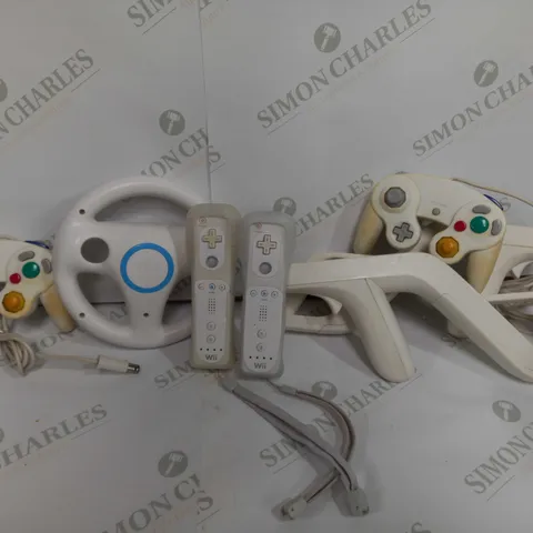 BOX OF ASSORTED 5 NINTENDO ACCESSORIES TO INCLUDE - WII STEERING WHEEL - WII GUN CONTROLLER MOUNT - WII CONTROLLER ECT 