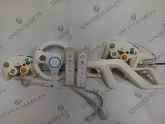 BOX OF ASSORTED 5 NINTENDO ACCESSORIES TO INCLUDE - WII STEERING WHEEL - WII GUN CONTROLLER MOUNT - WII CONTROLLER ECT 