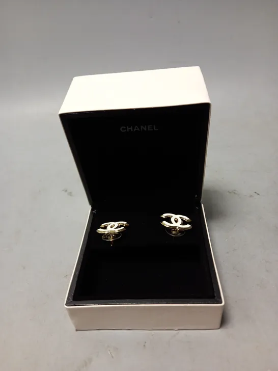 BOXED CHANEL CC WHITE ENAMEL REISSUED PIERCING EARRINGS