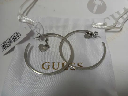 BOX OF 2 GUESS ITEMS TO INCLUDE HEART TO HEART LADIES HOOP EARRINGS AND DAKTARI LION SUD EARRINGS RRP £98