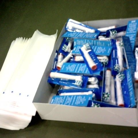 LARGE NUMBER OF ASSORTED ORAL-B PRODUCTS TO INCLUDE REPLACEMENT ELECTRIC TOOTHBRUSH HEADS AND TIDI SHIELD PROTECTIVE CUFF BARRIERS