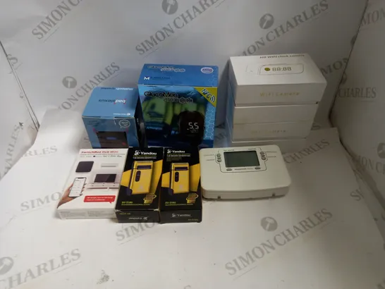 LOT TO CONTAIN APPROX. 8 X ASSORTED ELECTRONIC GOODS, WIFI CAMERAS, SPEAKER, GLUCOSE READER 