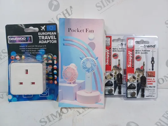 APPROXIMATELY 10 ASSORTED HOUSEHOLD ITEMS TO INCLUDE TREND QUICK RELEASE DRILL SYSTEM, POCKET FAN, EUROPEAN TRAVEL ADAPTOR, ETC