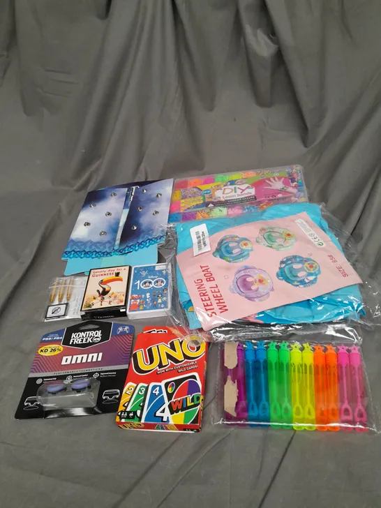 APPROXIMATELY 10 ASSORTED TOYS AND GAMES TO INCLUDE BUBBLES, HARRY POTTER AND UNO