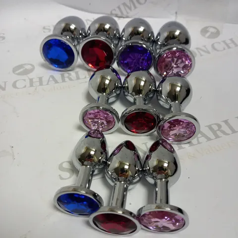 LOT OF APPROX 10 METAL ANAL PLUGS IN VARIOUS COLOURS AND SIZES