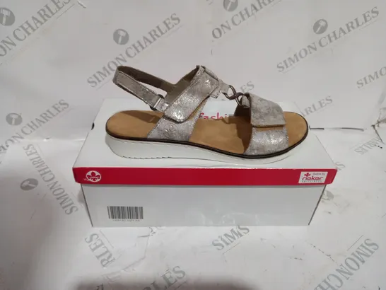 BOXED PAIR OF RIEKER MULTI-STRAP SANDALS IN METALLIC SILVER EU SIZE 39