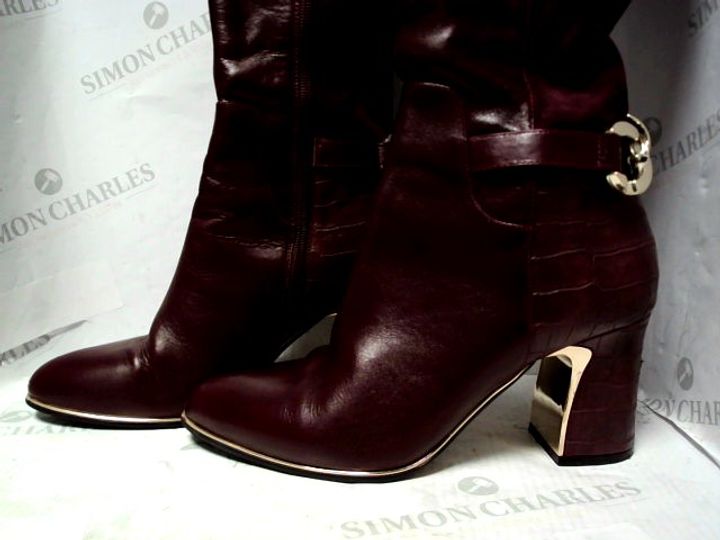 moda in pelle knee boots