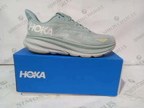 BOXED PAIR OF HOKA TRAINERS IN LIGHT BLUE UK SIZE 8