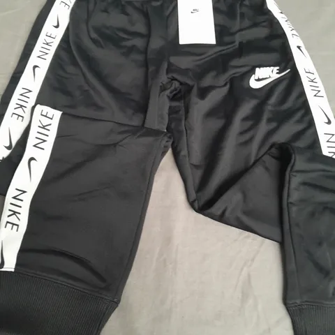 NIKE KIDS BLACK TAPE LOGO TRACKSUIT BOTTOMS - L G