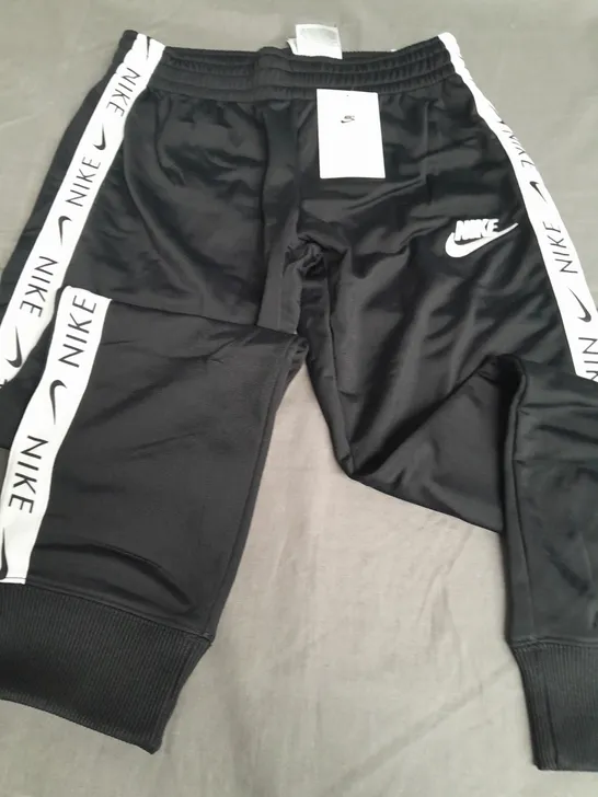 NIKE KIDS BLACK TAPE LOGO TRACKSUIT BOTTOMS - L G