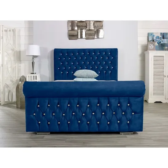 HERVELINE UPHOLSTERED BED FRAME IN BLUE (4 BOXES)