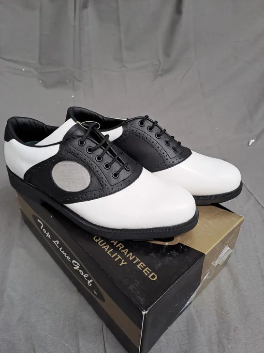 BOX OF APPROXIMATLY 12 BLACK AND WHITE TOP LINE GOLF SHOES VARIOUS SIZES 