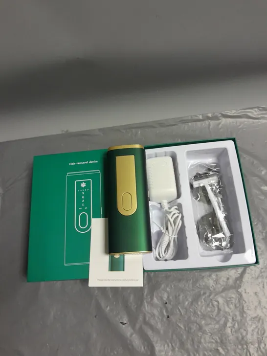 BOXED UNBRANDED HAIR REMOVAL DEVICE IN GREEN