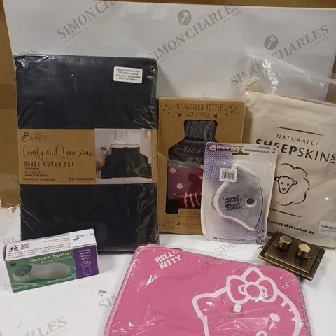 LOT OF APPROX 10 ASSORTED ITEMS TO INCLUDE A HELLO KITTY TABLET CASE, A NATURAL SHEEPSKIN MONGOLIAN CUSHION COVER, A SEASONAL HOT WATER BOTTLE ETC.  