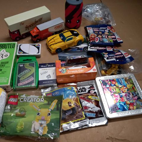 CRATE OF ASSORTED TOYS AND GAMES TO INCLUDE DIE CAST CARS, CARD GAMES AND LEGO MINI FIGURES