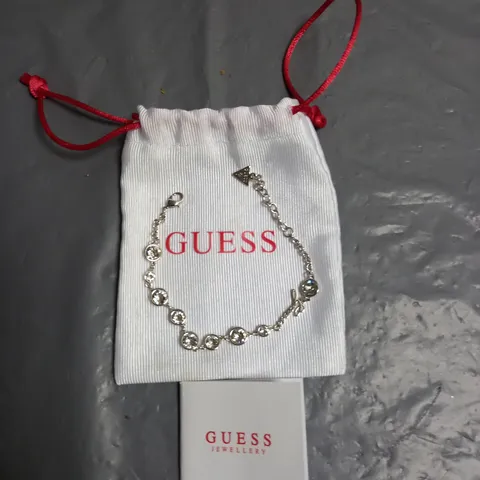 GUESS LADIES SILVER PLATED BRACELET WITH CRYSTAL DETAIL, INCLUDES DRAWSTRING BAG