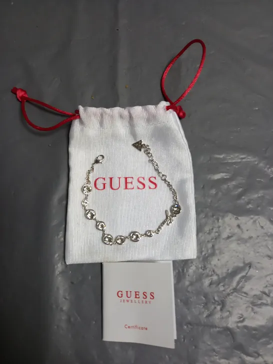 GUESS LADIES SILVER PLATED BRACELET WITH CRYSTAL DETAIL, INCLUDES DRAWSTRING BAG