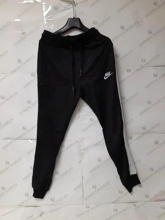 NIKE JOGGERS IN BLACK AND WHITE SIZE XL