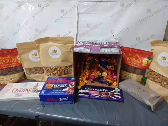 APPROXMATELY 10 ASSORTED SNACKS AND SWEET ITEMS TO INCLUDE QUALITY STREET SWEETS, NUTSOASIS NUTS, KELLOGS FROSTIES BARS, ETC