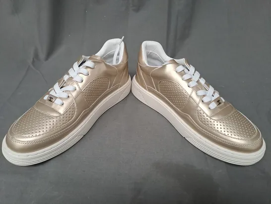 BOXED PAIR OF CHANEL SNEAKERS IN GOLD EU SIZE 39