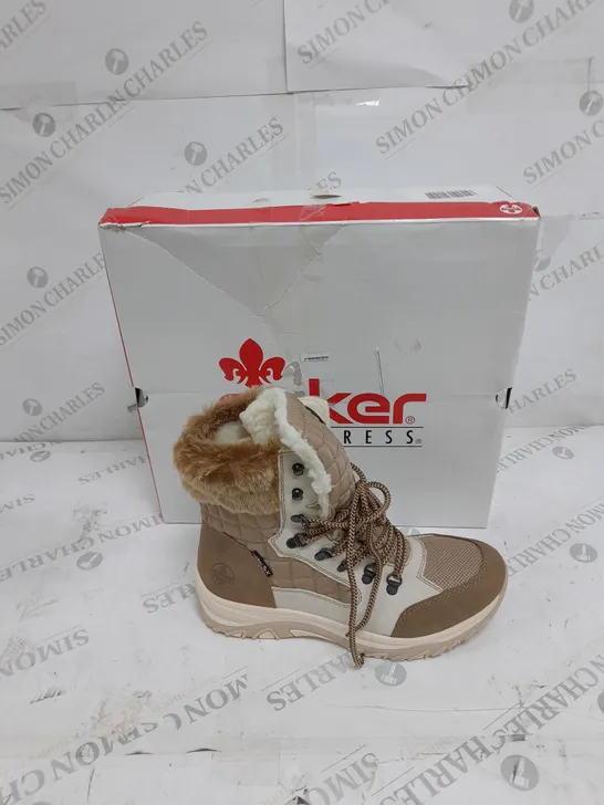 BOXED PAIR OF RIEKER CREAM WINTER FUR HIKE BOOTS IN SIZE 5 