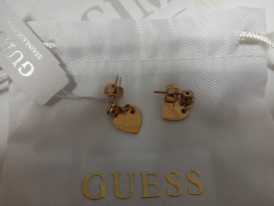 BOX OF 2 GUESS ITEMS TO INCLUDE HEART TO HEART LADIES ROSE GOLD EARRINGS AND FINE HEART BRACELET RRP £78