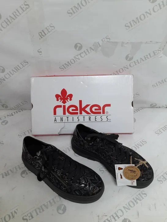 BOXED PAIR OF RIEKER FLORAL TRAINERS IN BLACK SIZE 4