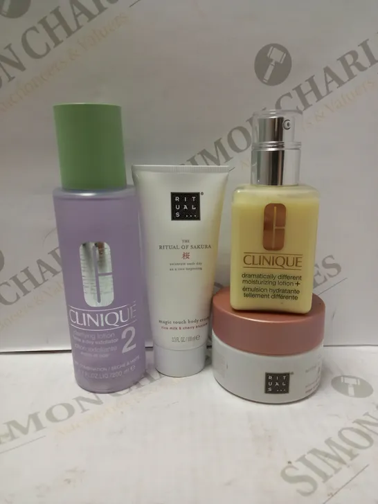 LOT OF 4 ASSORTED BEAUTY PRODUCTS TO INCLUDE CLINIQUE MOISTURIZING LOTION, THE RITUAL OF SAKURA BODY CREAM, CLINIQUE CLARIFYING LOTION, ETC 