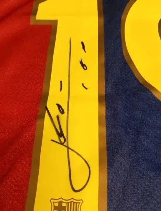 BARCELONA FC HOME JERSEY SIGNED BY LIONEL MESSI WITH CERTIFICATE OF AUTHENTICITY