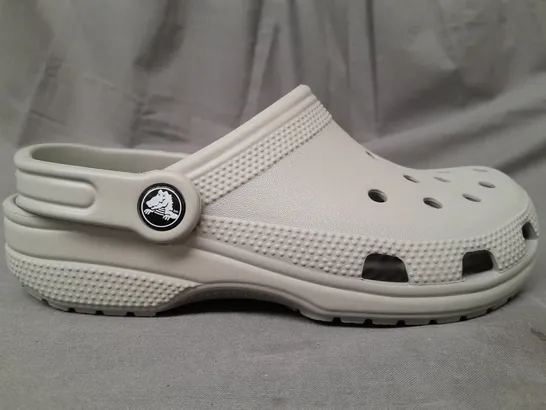 PAIR OF CROCS CLASSICS IN GREY UK SIZE M3/W4