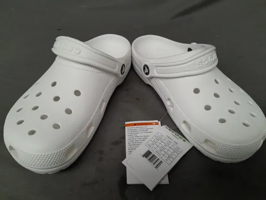 PAIR OF CROCS CLASSICS IN WHITE UK SIZE M6/W7