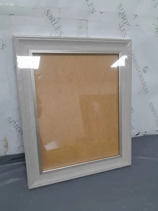 SEALED PICTURE FRAME APPROXIMATELY 36CM X 43.5CM 