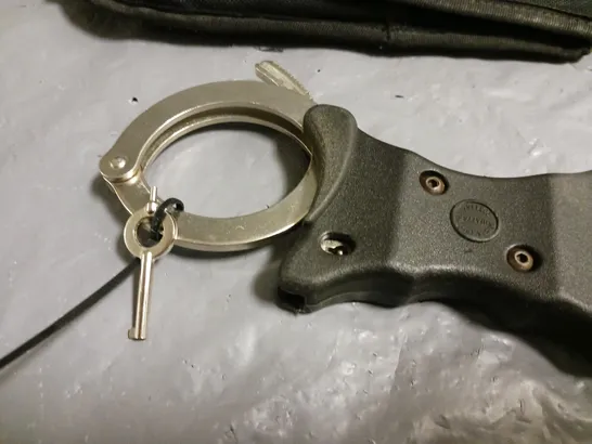 HIATTS HANDCUFFS IN CARRY CASE